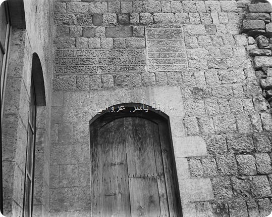 نقوش اسلامية على أحد جدران الجامع النوري